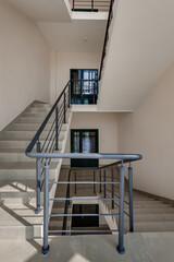 stairs emergency and evacuation exit stair in up ladder in a new office building