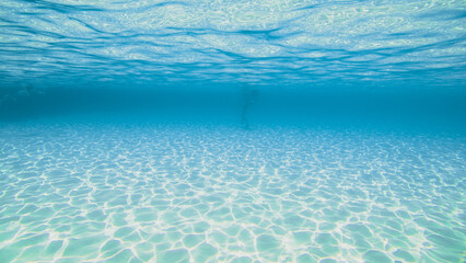 Clear bright underwater white sand beach Mediterranean waters in Blue Lagoon, Malta Island
