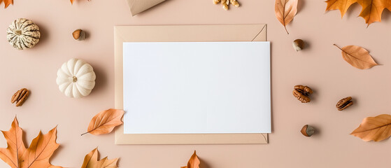 Fototapeta premium coral-colored background with flowers, an envelope, and an empty sheet. The arrangement showcases vibrant, elegant, and modern design elements, card, invitation, template