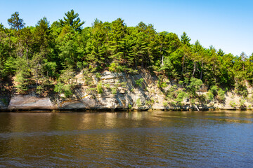 The Cambrian sandstone bluffs along the Wisconsin River in the Wisconsin Dells.