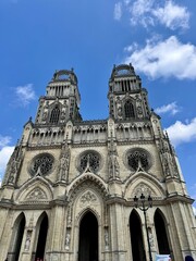 Fototapeta premium view of the facade of the holy cross cathedral of orleans on a sunny summer day 