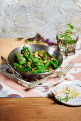 Freshly prepared roasted green pimientos