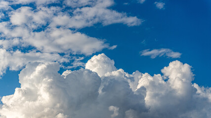 cumulus clouds in blue sky