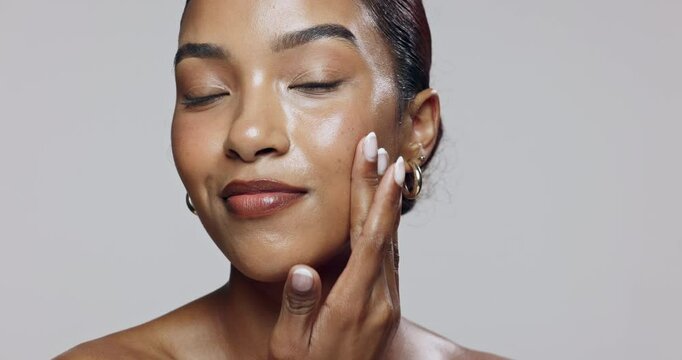 Woman, serum and face for skincare, application and cosmetics with facial, glow and transformation. Model, dermatology and hyaluronic acid in studio for skin, hydration and beauty on white background