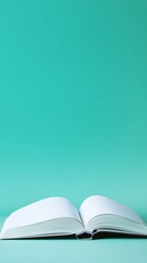 Open book on turquoise background, minimalistic education concept
