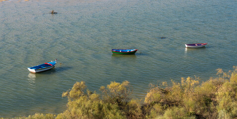 Loan Boat at low tide during sunrise, Cacela Velha, Portugal © matthew