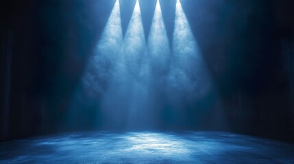 Empty theater with a single spotlight shining on stage wallpaper