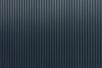 Fototapeta premium simple and clean image of a black fence, serving as a backdrop