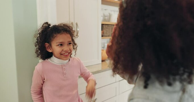 Mother, happy child and measure height with high five for goal, success or development of girl. Parent, check growth and kid on wall with pencil mark for health, progress and care with family in home