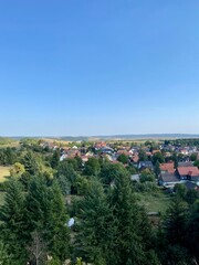 Fototapeta premium der Röhrigschacht bei Wettelrode mit blick zur Halde Hohe Linde und dem funkturm bei Lengefeld im Mansfeld