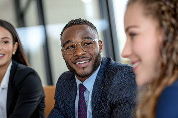 a corporate mentorship program meeting, showing pairs of mentors and mentees from diverse backgrounds engaged in conversation
