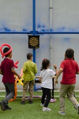 kids playing darts