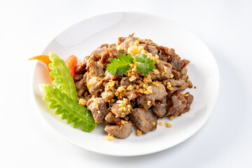 Stir-fried pork with garlic and pepper on white background