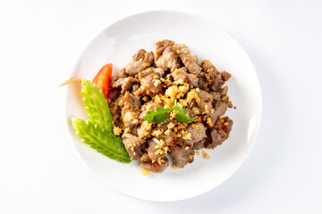 Stir-fried pork with garlic and pepper on white background