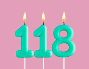 Birthday card with green number 118 candle - Pastel pink background