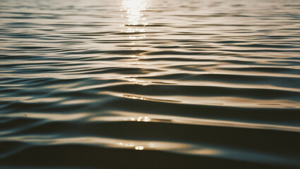 background image of sea water with soft waves and reflection of sunlight - Powered by Adobe