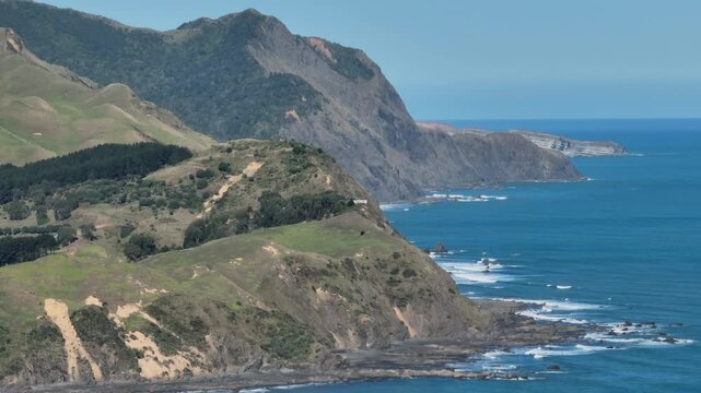 Wild coastline of farmland and Tasman Sea in Marokopa, Waikato, New Zealand.