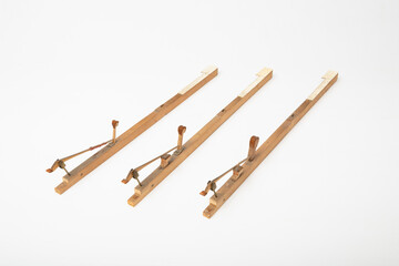 Vintage Wooden Piano Hammer Mechanism Isolated on White Background, Easy to Convert to Transparent PNG for Graphic Design and Restoration Projects
