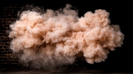 Dramatic cloud of smoke against a dark background