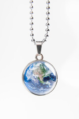 Earth-Themed Pendant Necklace with Globe Design Isolated on White Background