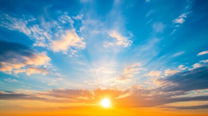 Fototapeta premium Sunny sunrise over horizon with vibrant clouds, peaceful morning concept