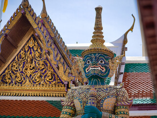 Thai giant guardian.  A closed up shooting of Tossakan, very famous giant character from Ramayana. Beautiful art giant statue protecting the Grand Palace Temple.