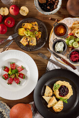 Gourmet Snack Platter with Fresh Vegetable Dishes and Dips