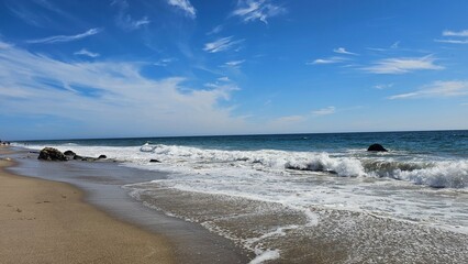 blue skies crystal clear sea at beach in california