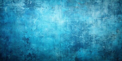 Obraz premium A grunge blue background with distressed textures and layers