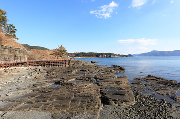 Pathway and natural monument No 411 of Sangjogam County Park besides sea near Goseong-gun, South Korea 