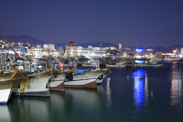 Sacheon-si, Gyeongsangnam-do, South Korea - December 16, 2020: Night view of fishing boats at Samcheonpo Port