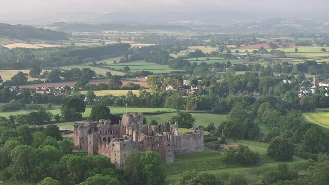 Aerial clip of Raglan Castle in Monmouthshire, Wales, United Kingdom, Europe