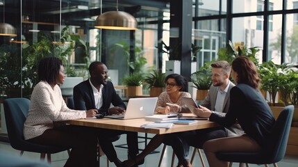 A diverse group of professionals gather around a table, engaged in a lively discussion.