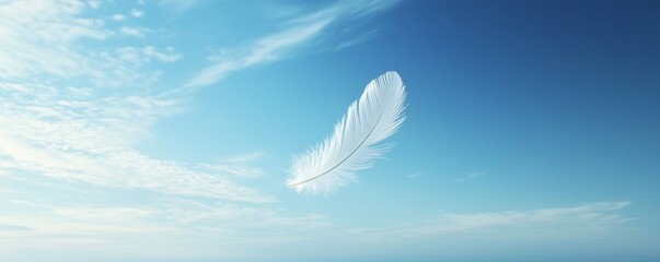 White feather floating against a blue sky