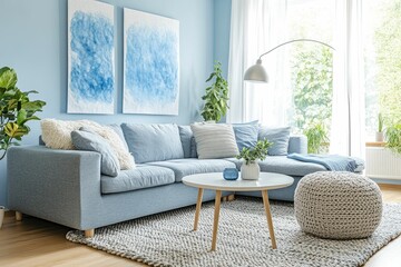 Fototapeta premium Cozy living room with blue decor and plants.