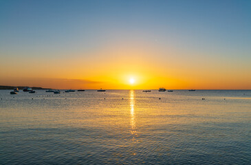 Fototapeta premium Sunrise over the sea. Panoramic seascape.