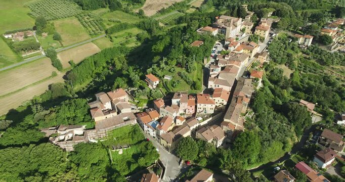 Charming Town With Farmland Backdrop In Lorenzana In The Province of Pisa, Italian Region Tuscany. Aerial Drone Shot