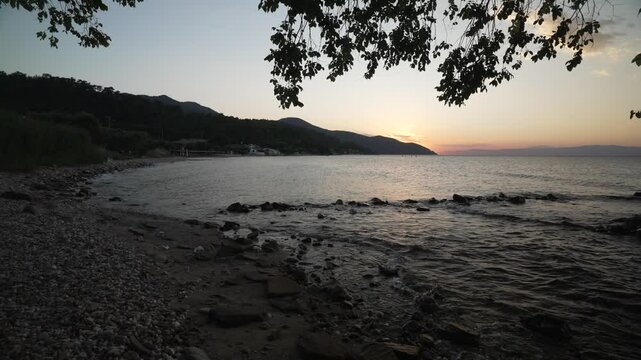 View of Papias Beach and Aegean Sea at sunset near Thassos Town (Limenas), Thassos, Aegean Sea, Greek Islands, Greece, Europe