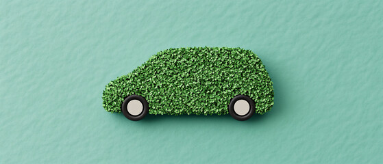 A creative representation of an eco-friendly car made from green grass on a turquoise background, symbolizing sustainability.