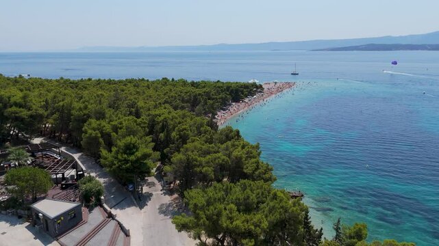 Aerial View of the Paklina Fkk⁩⁦ Beach in Bol on Brac Island, Split Dalmatia, in Croatia. Summer Vacation Resort Near Golden Cape or Golden Horn Zlatni Rat Beach. Famous Adriatic Beach on Adriatic Sea