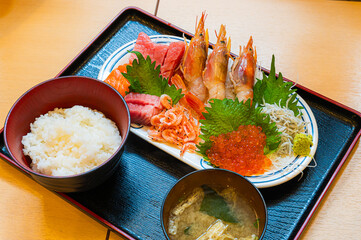 Exquisite seafood and Seafood bowl with fresh fish at Japanese restaurant.