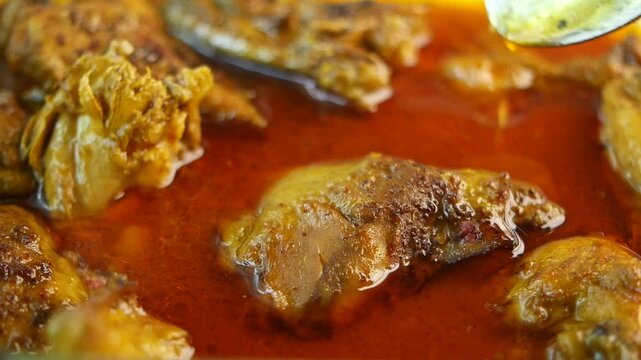 Chicken curry or masala in a bowl on table 