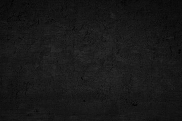 Black dark concrete wall background. Pattern board cement texture grunge dirty abstract design element decor. Blackboard blank.