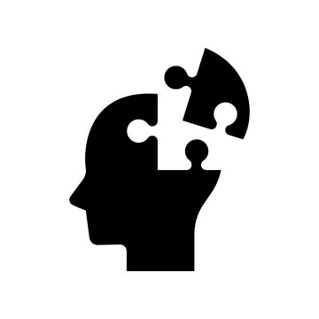 recommend clip art: Human head with jigsaw puzzle piece icon isolated on white background.