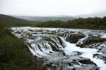 Bruarafoss waterfall Iceland. Waterfall with clear blue water
