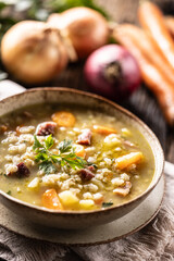 Soup made from barley groats, smoked pork neck, potatoes and root vegetables