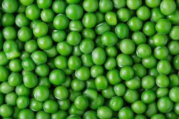 Fresh green peas background in full frame
