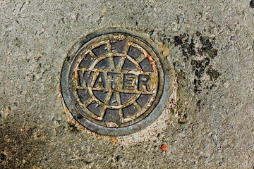 Manhole cover for water, Denver, Colorado, USA