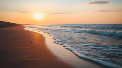 Fototapeta premium Golden Sunset Over Sandy Beach with Foamy Waves