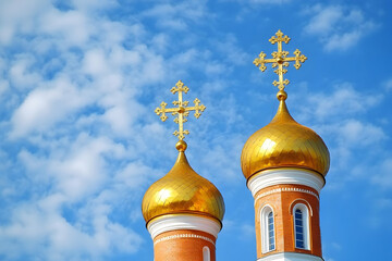 Golden Domes and Crosses of a Church against a Blue Sky with White Clouds
